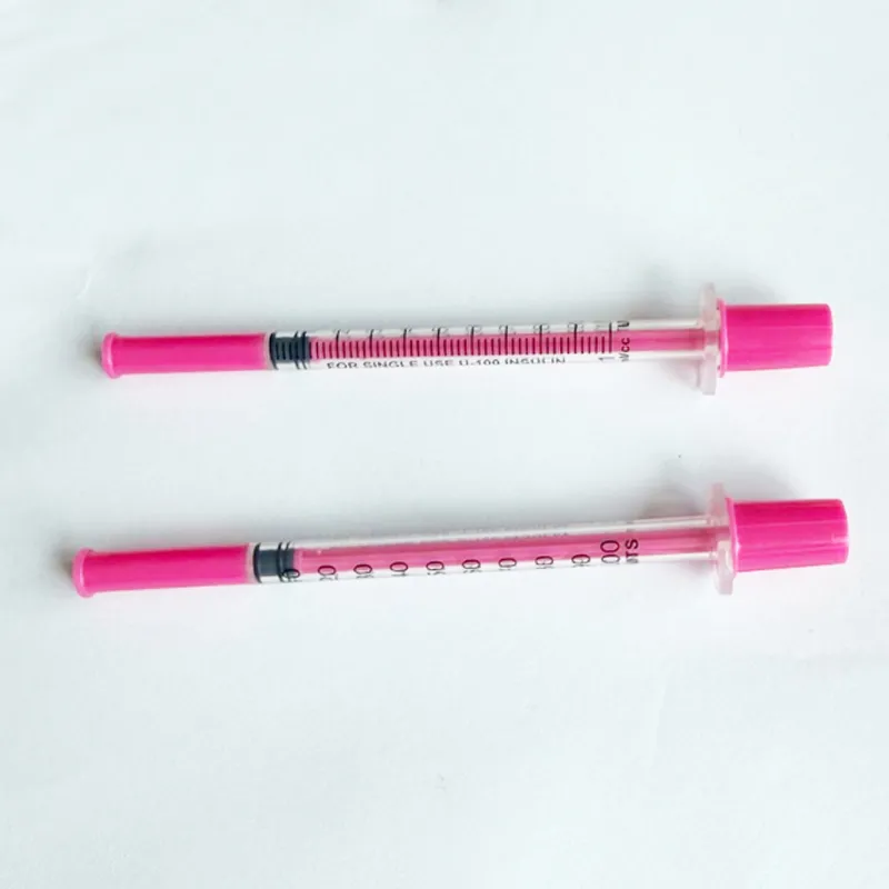 Pink disposable insulin syringe 31G 1cc 8ml